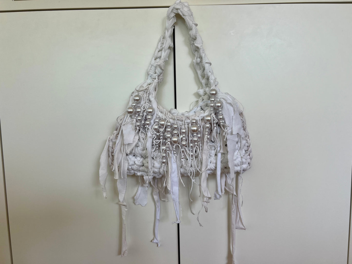 White goddess bag