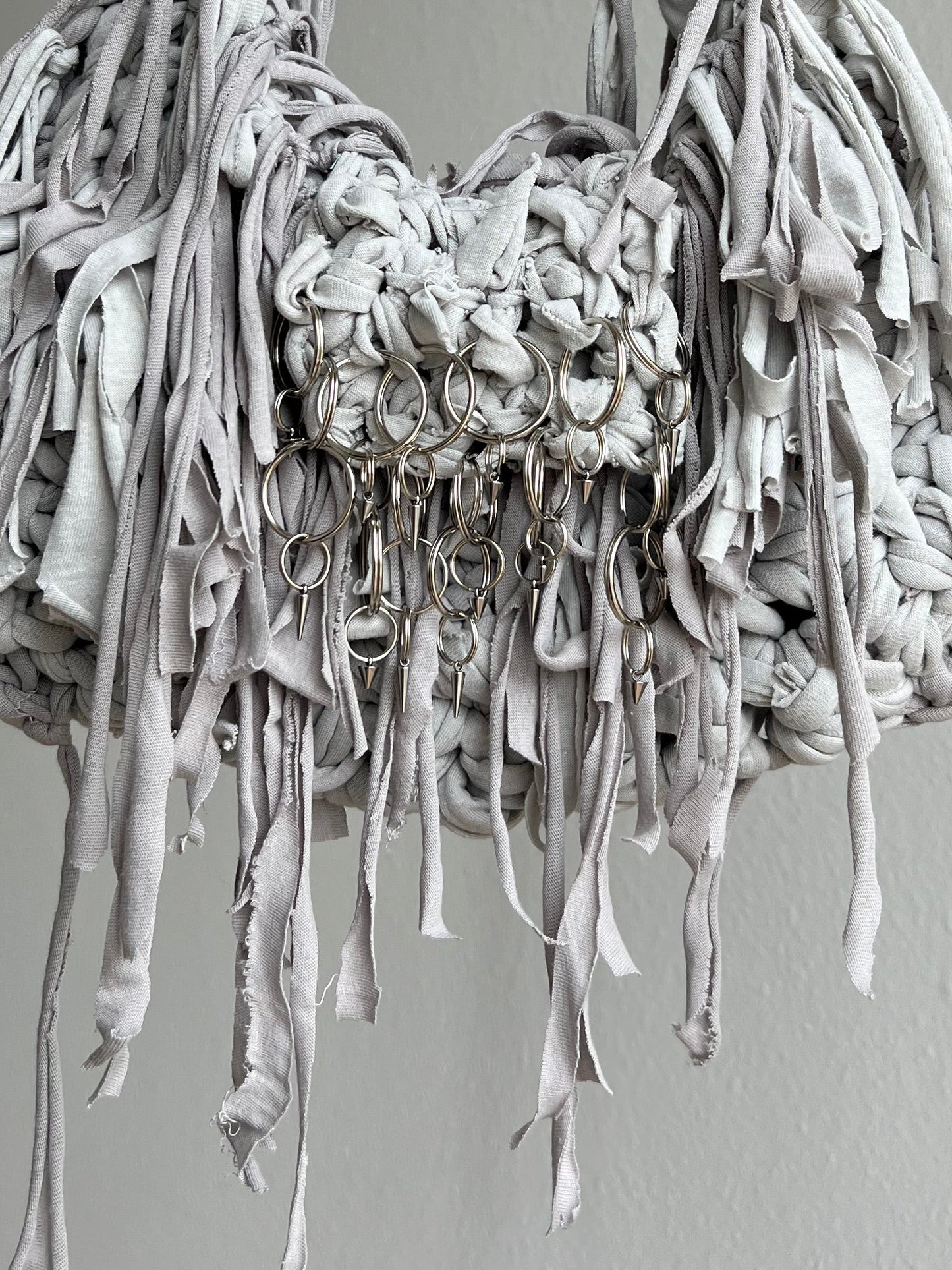 Grey spiky rings&fringe bag