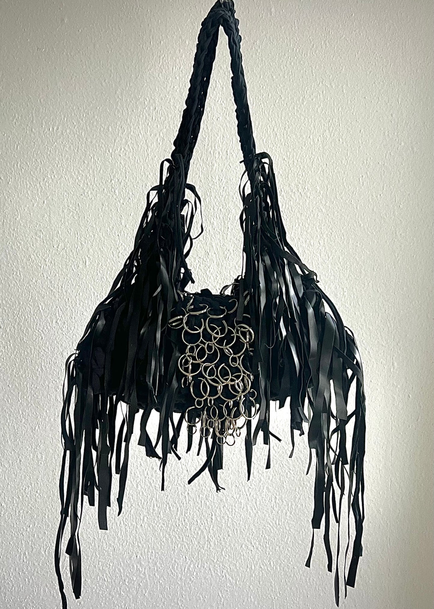 Black leather fringe bag