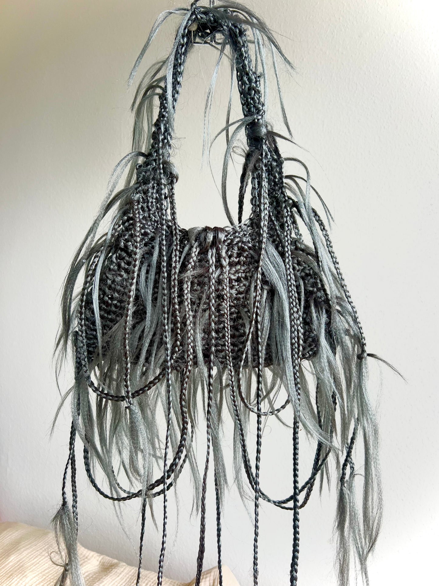 Monochrome grey hair bag